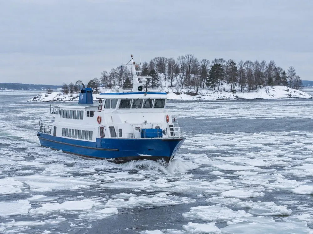 The Suomenlinna ferry crossing the harbour on a winter afternoon